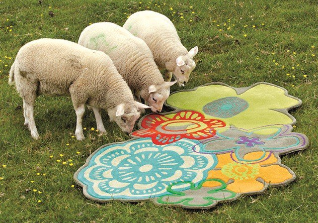 Sheep eating a rug