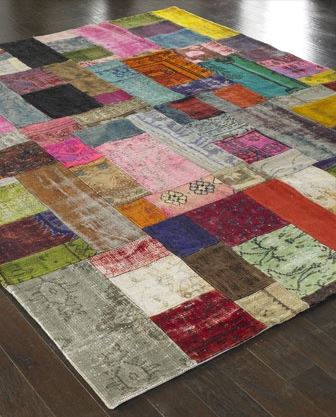 Patchwork rug on a wooden floor