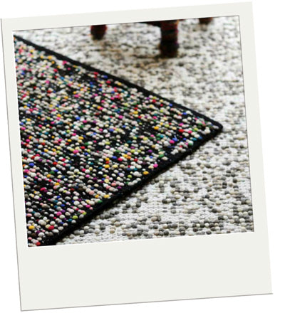 multi colour black rug corner shot close up