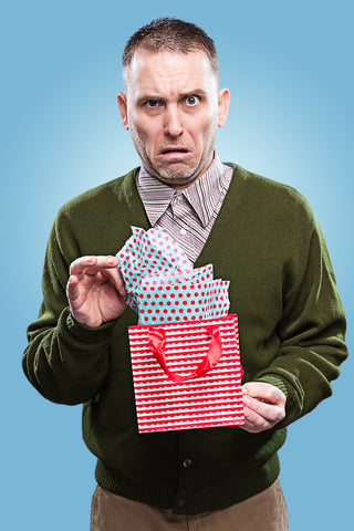 Unhappy employee with his Christmas gift