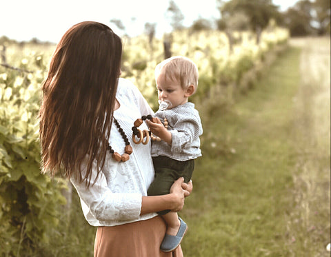 Wood and Silicone Teething Set. Includes a Mama Teething Necklace and Baby Teething Ring made of silicone + wood. Perfect baby toy with rattle. Based in Malta and Denmark. Makes an ideal baby shower gift for mum and baby.