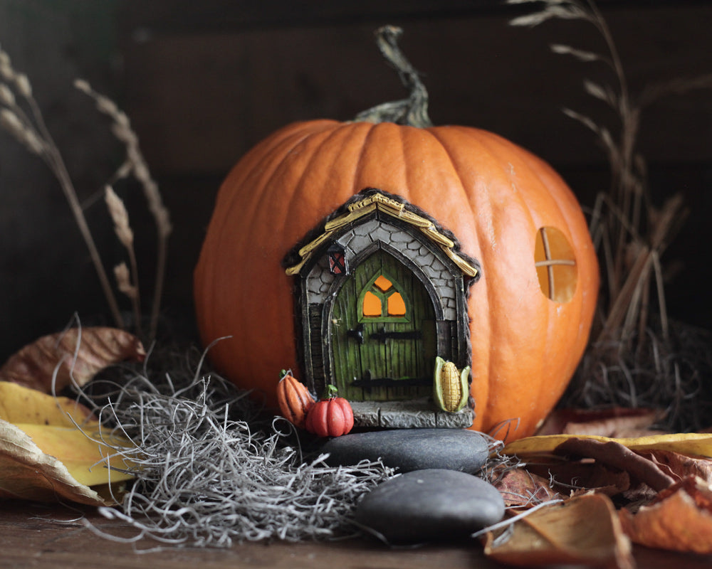 Fairy pumpkin house for a Halloween fairy garden