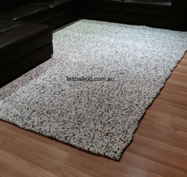 natural stone pom pom rug