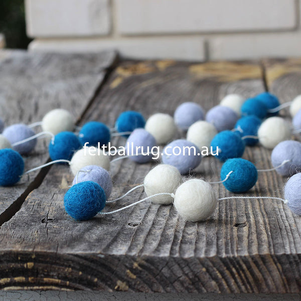 Blue and white felt ball garland