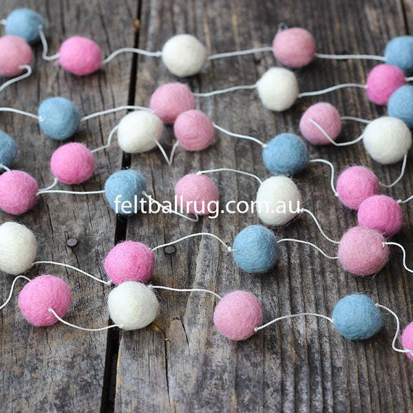 pink and white felt ball garland