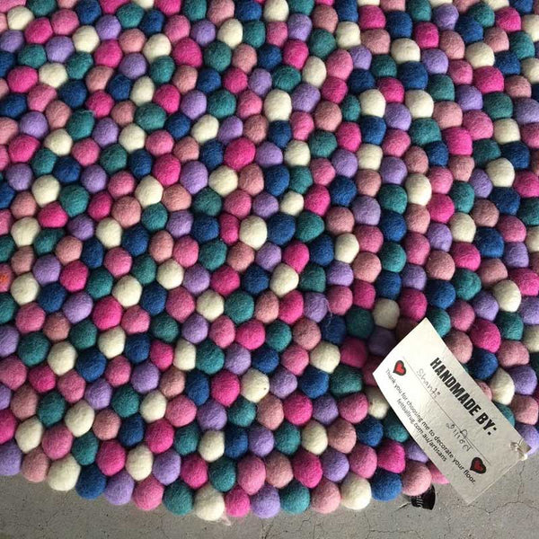 felt ball rug pretty pastels