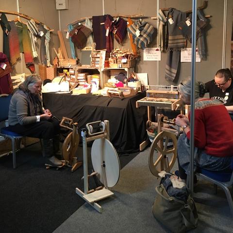 Spinners busy playing with wheels on our stand at EYF