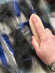 Brushing in the fibre onto the board