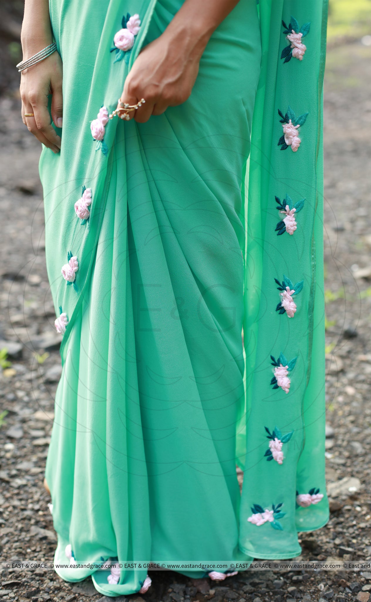 Baby Pink Rose Flowers on a Sea Green Pure Silk Georgette Saree