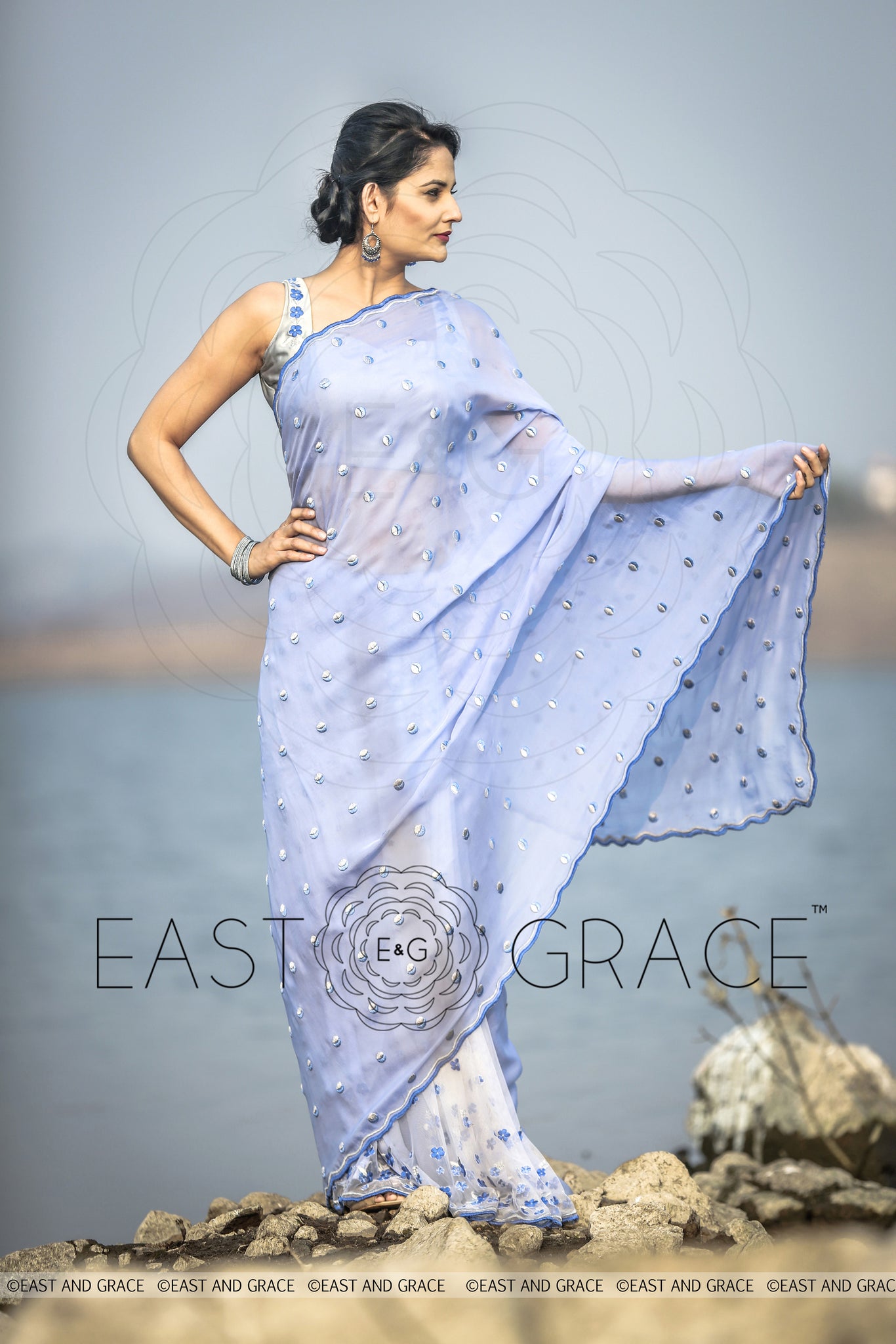 Foget me not blue pure silk chiffon net fabric hand embroidered saree