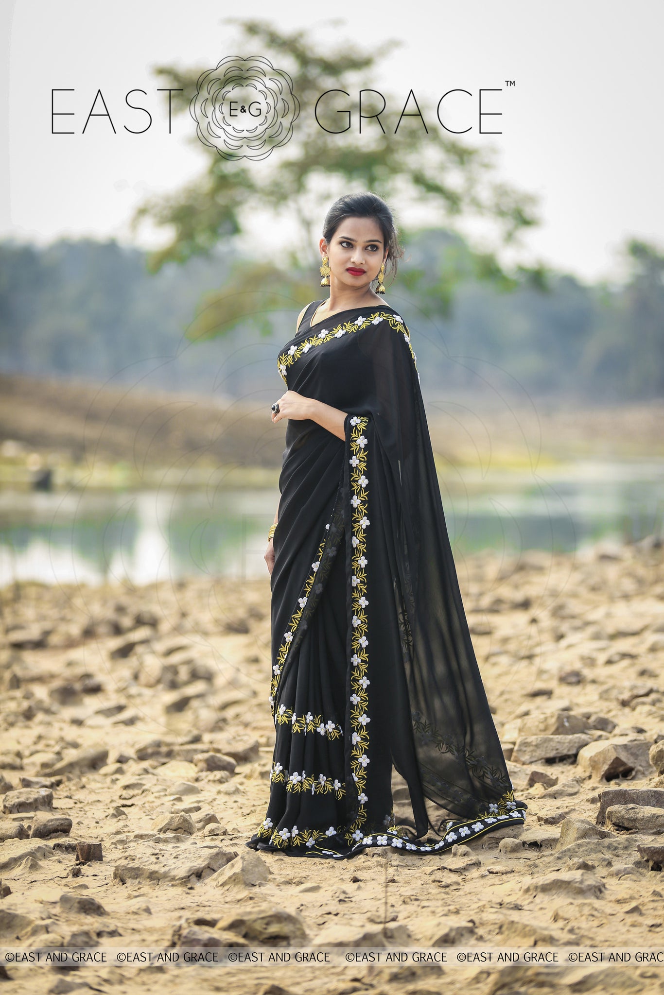 Black Buttercup pure Georgette hand embroidered saree