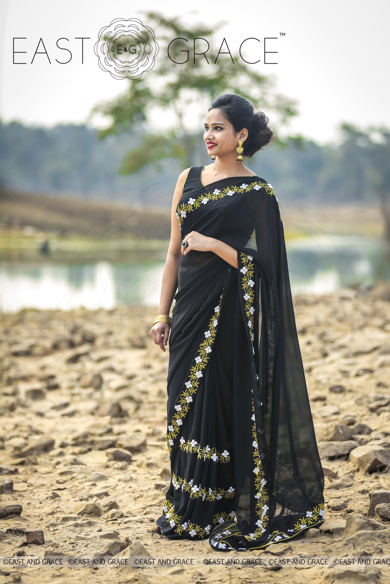 Black Buttercup pure Georgette hand embroidered saree