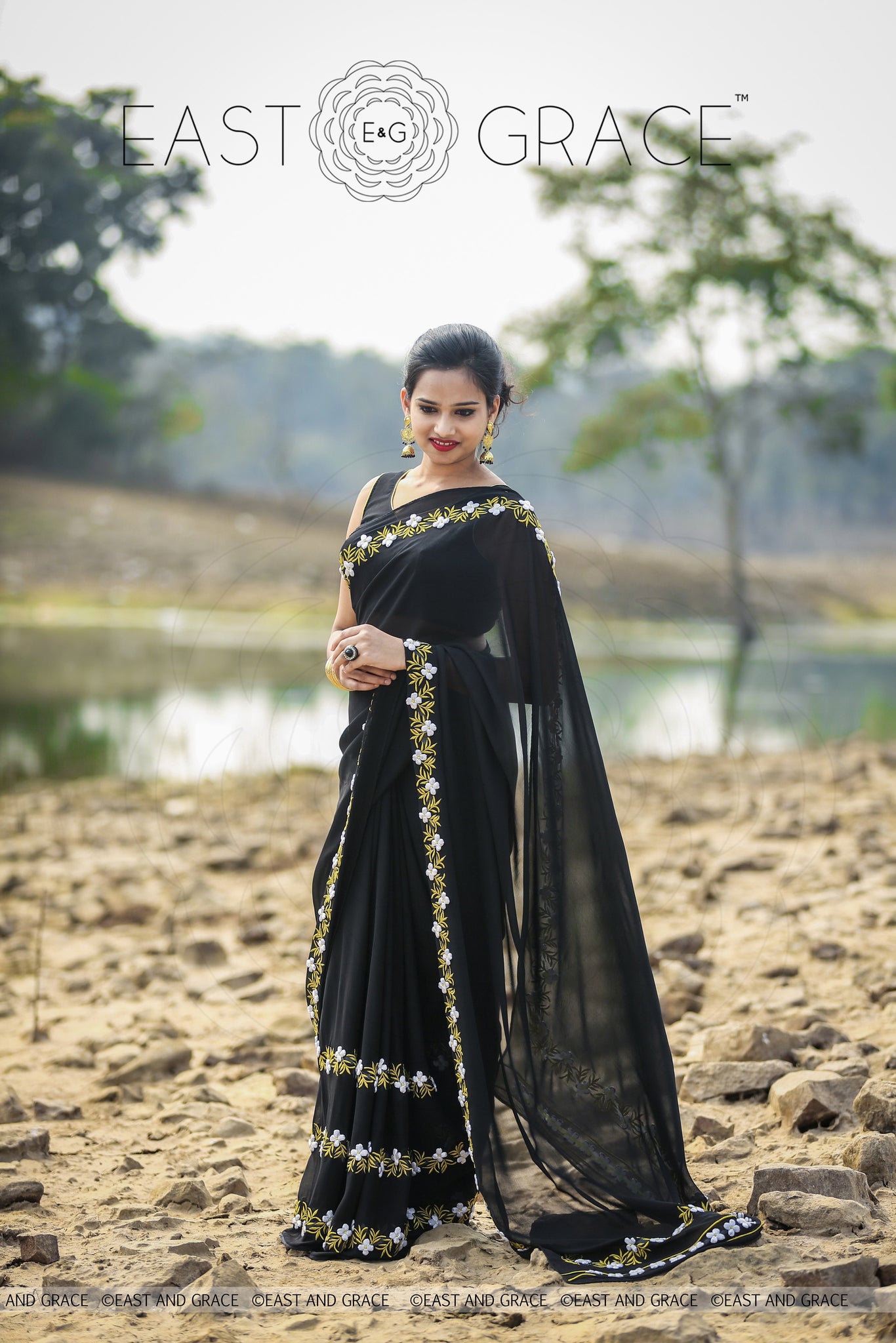 Black Buttercup pure Georgette hand embroidered saree