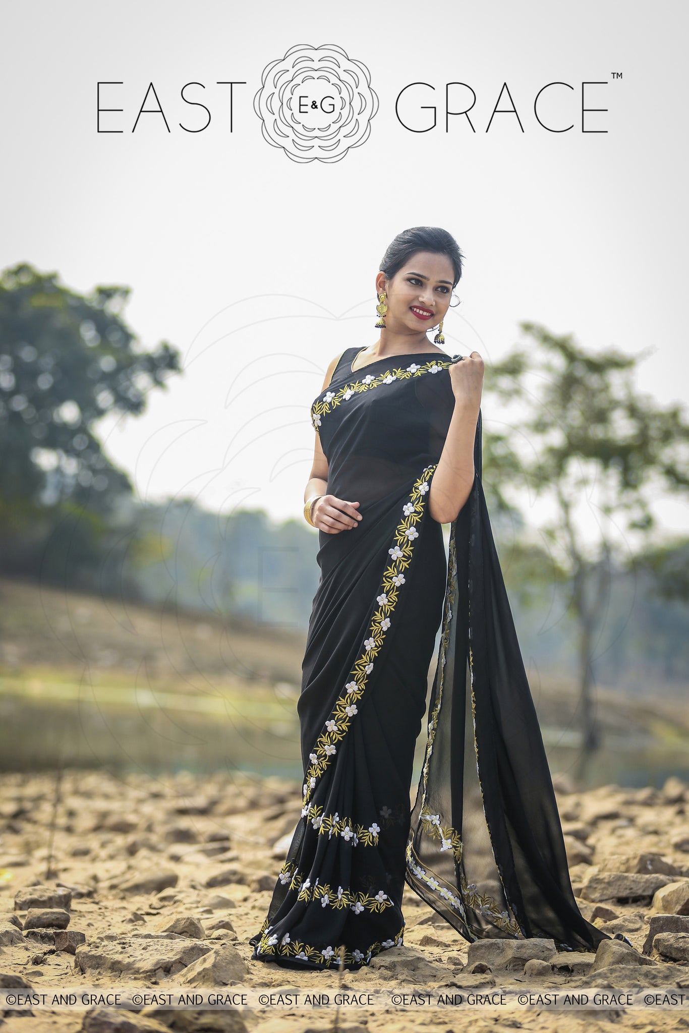 Black Buttercup pure Georgette hand embroidered saree