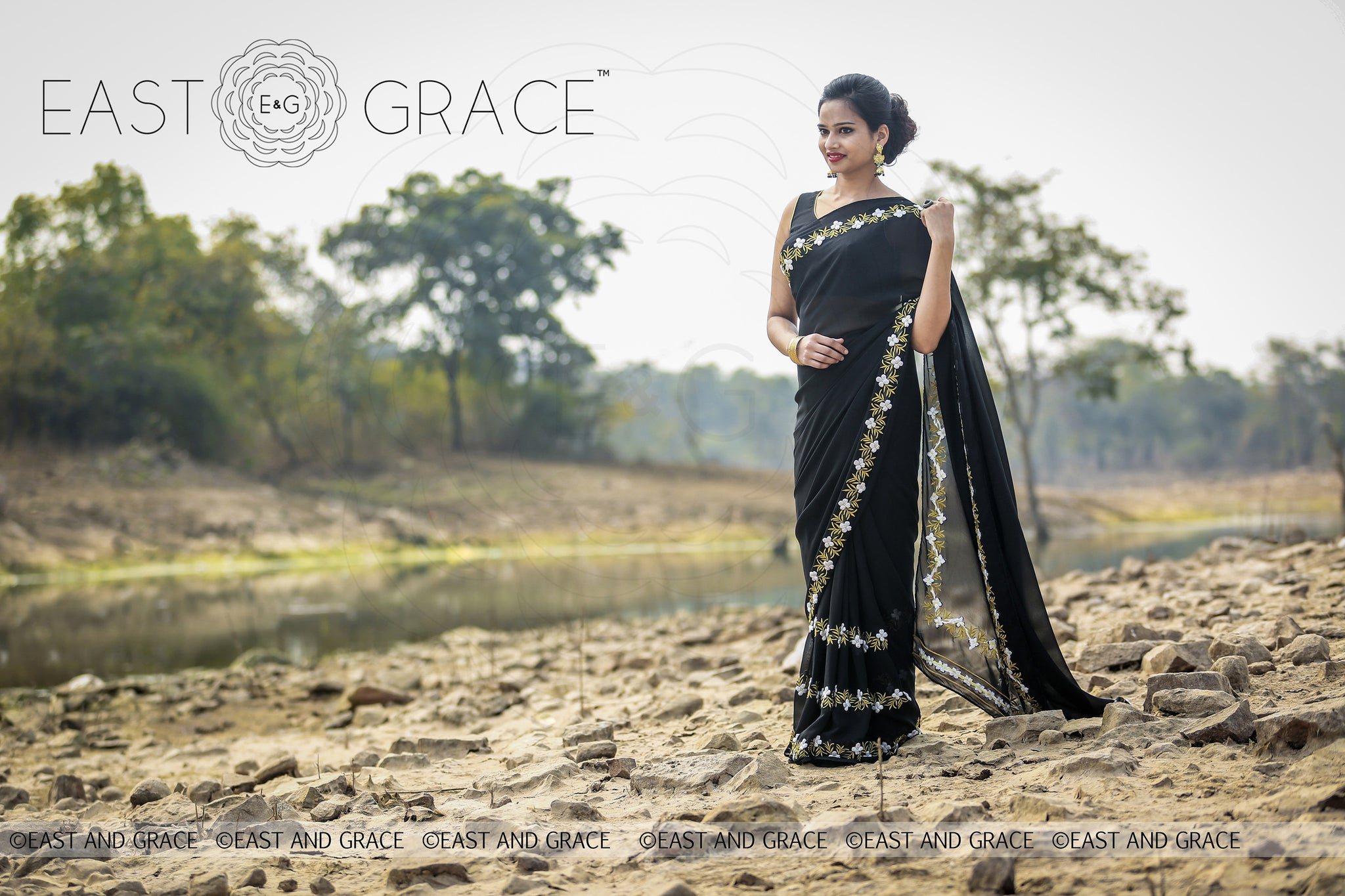 Black Buttercup pure Georgette hand embroidered saree