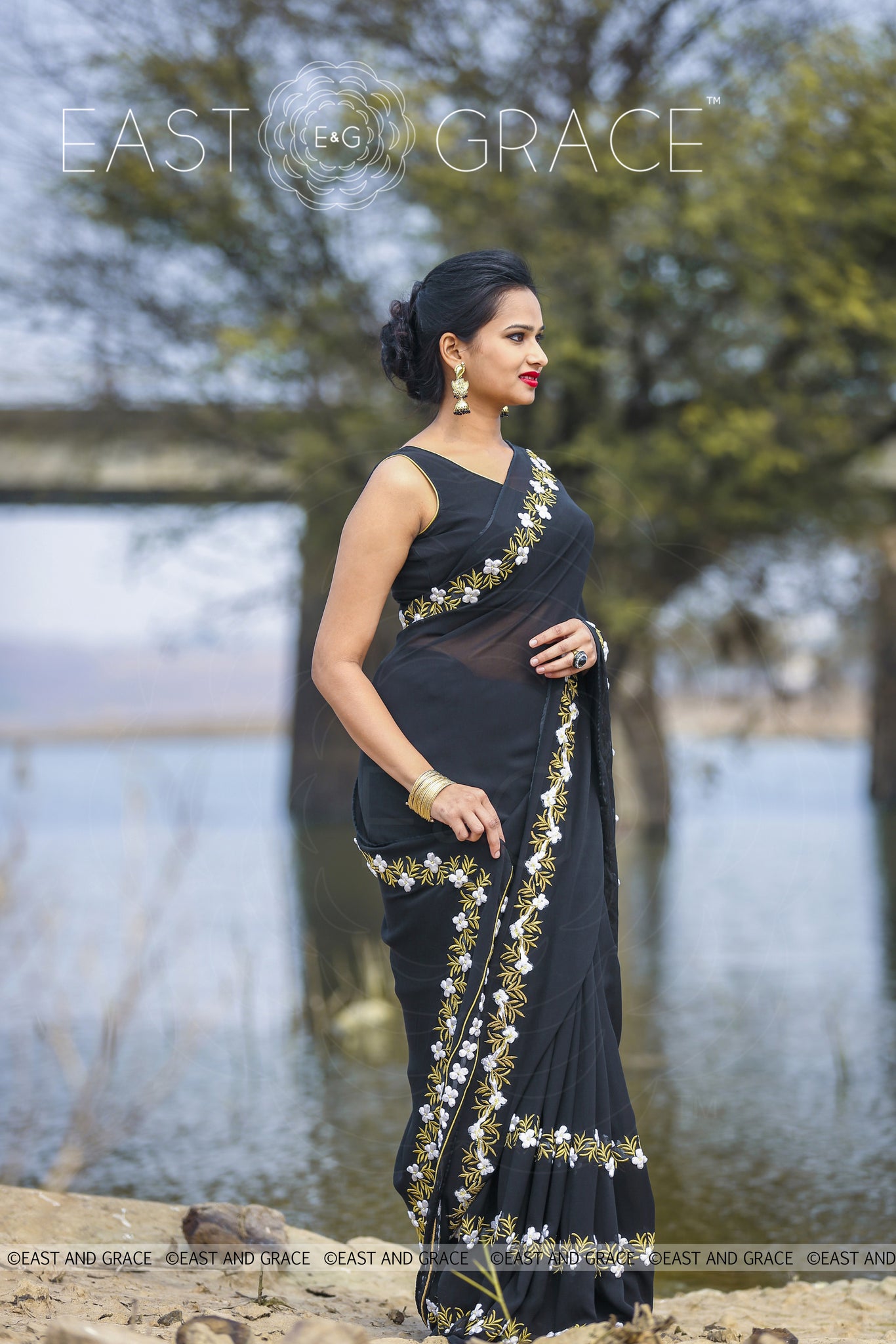 Black Buttercup pure Georgette hand embroidered saree