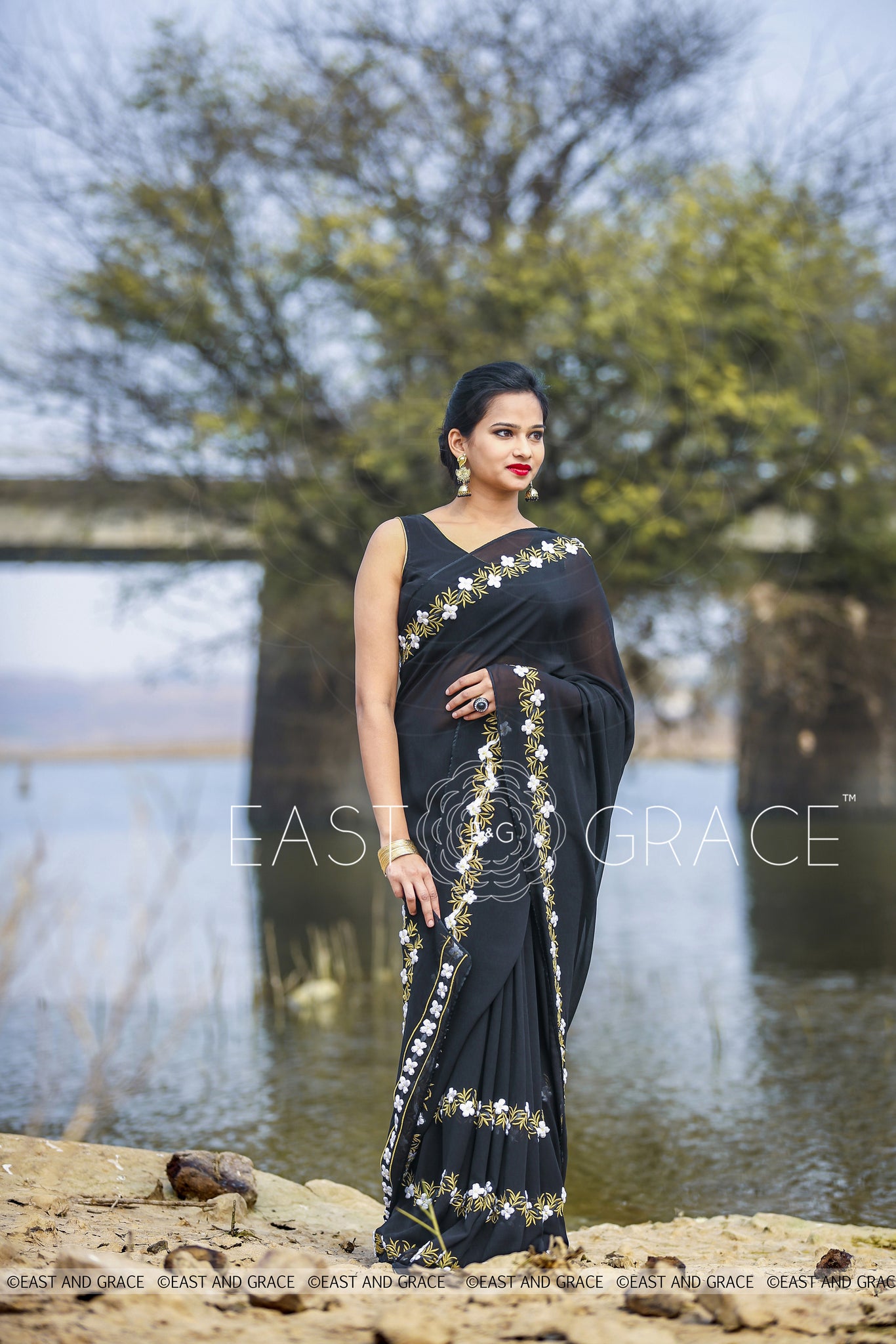 Black Buttercup pure Georgette hand embroidered saree