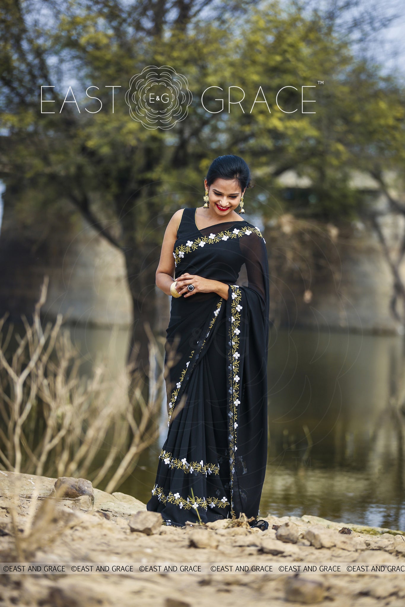 Black Buttercup pure Georgette hand embroidered saree