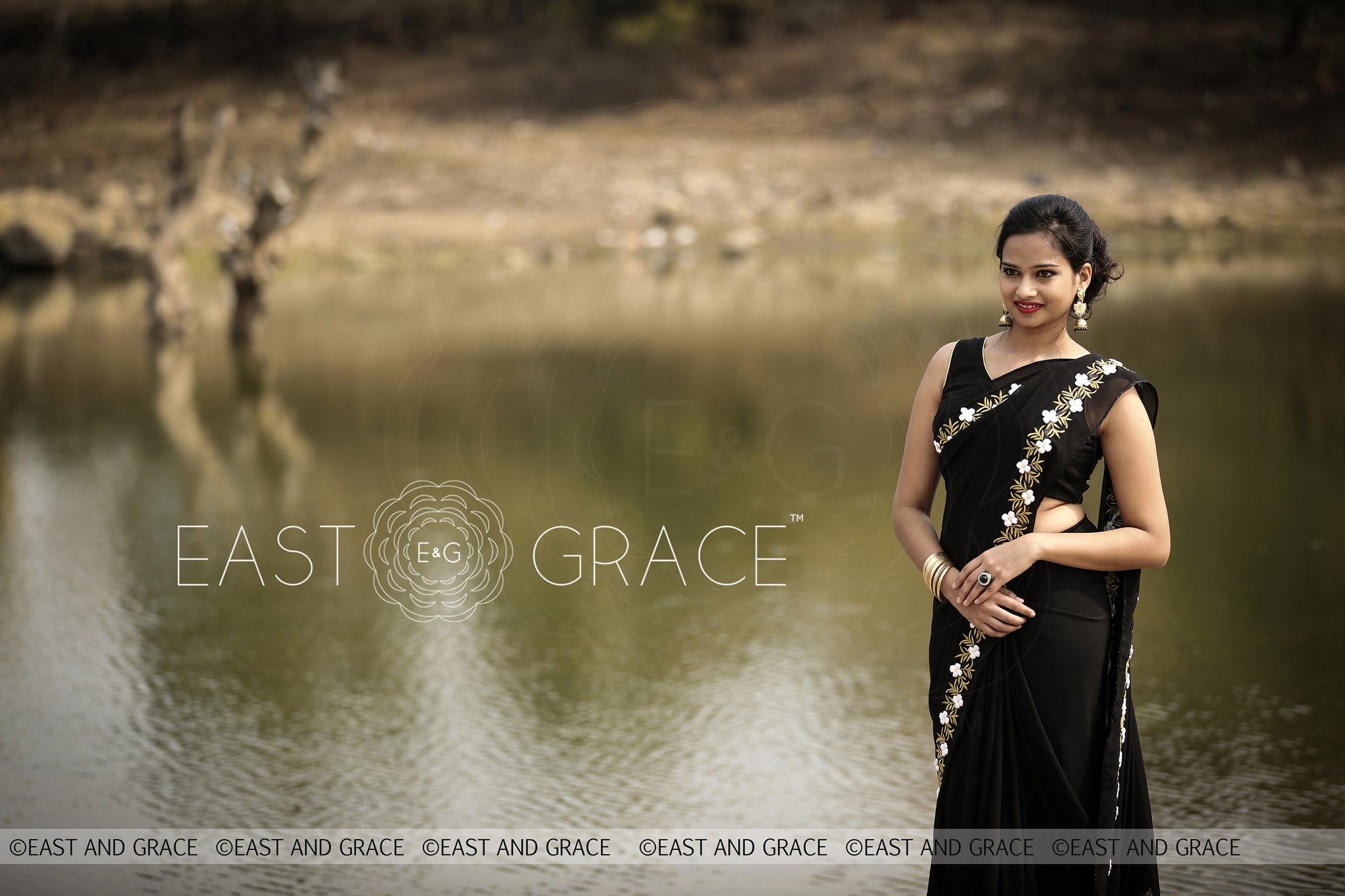 Black Buttercup pure Georgette hand embroidered saree