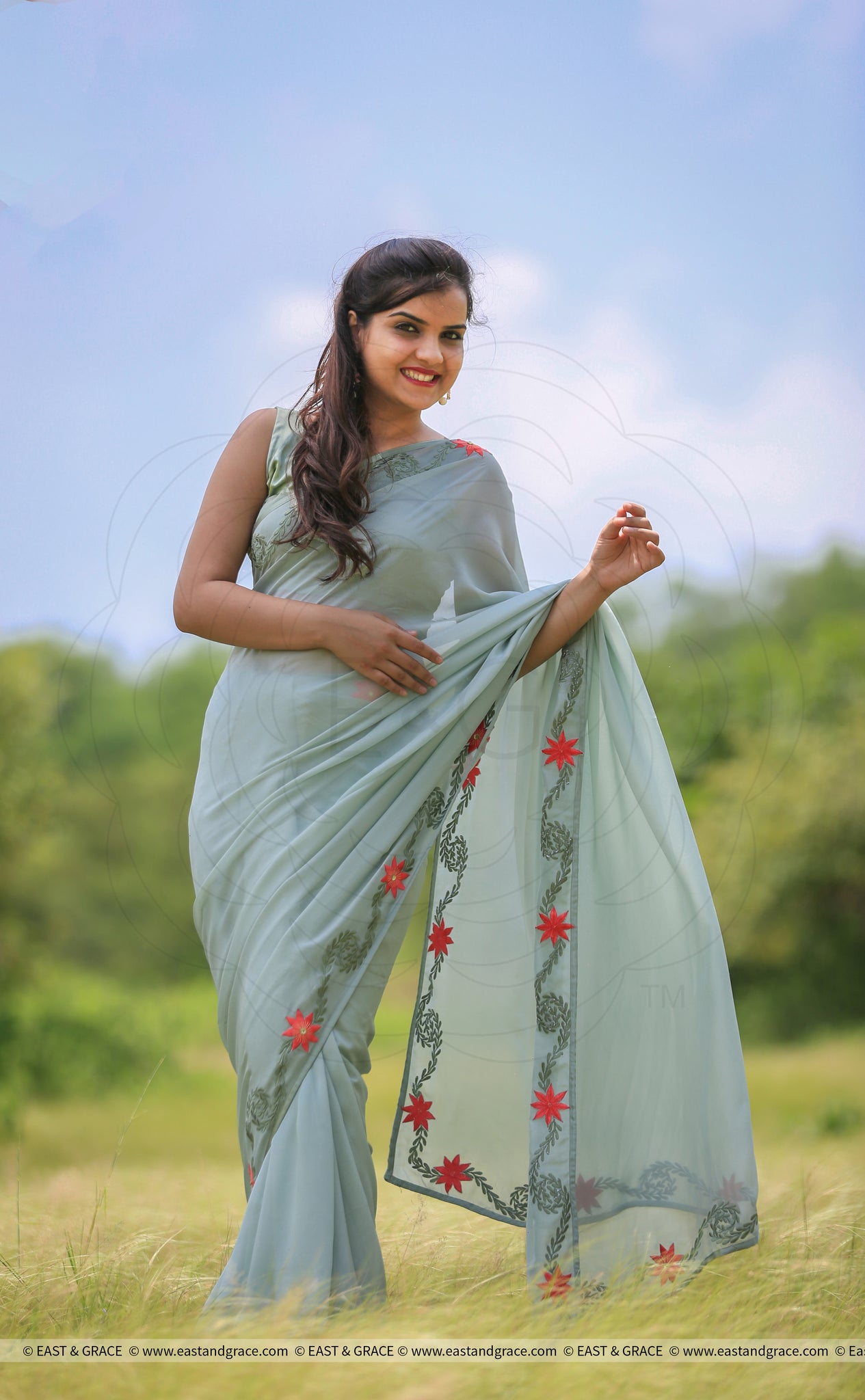 Sage Green Pure Georgette Saree with Embroidered Lilies