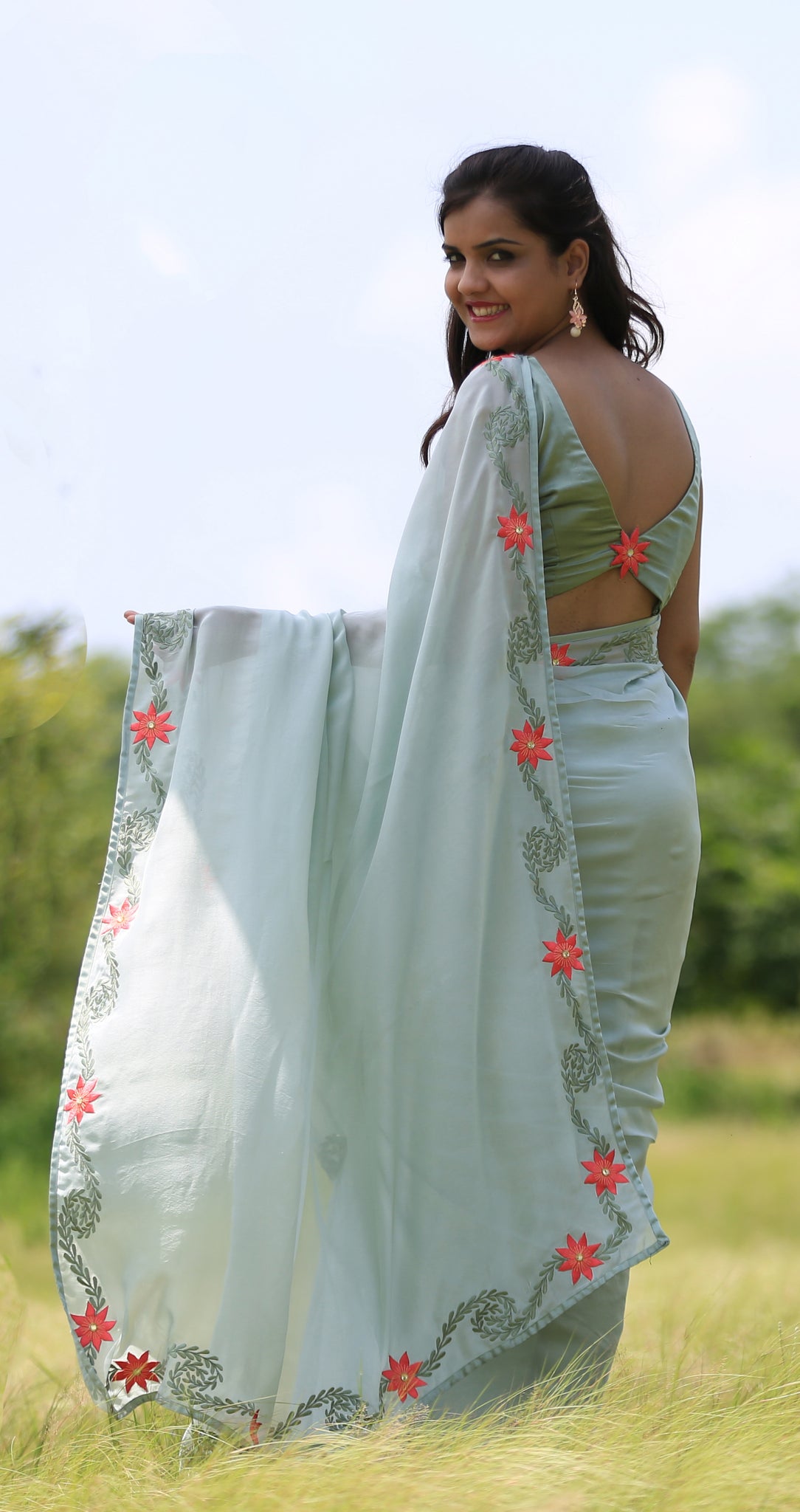Sage Green Pure Georgette Saree with Embroidered Lilies