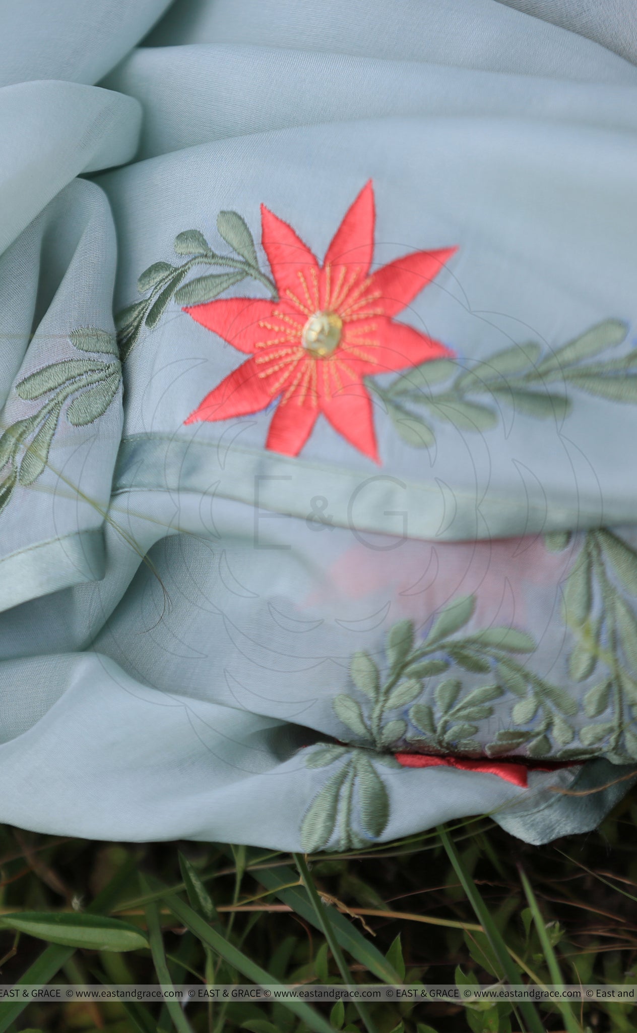 Sage Green Pure Georgette Saree with Embroidered Lilies