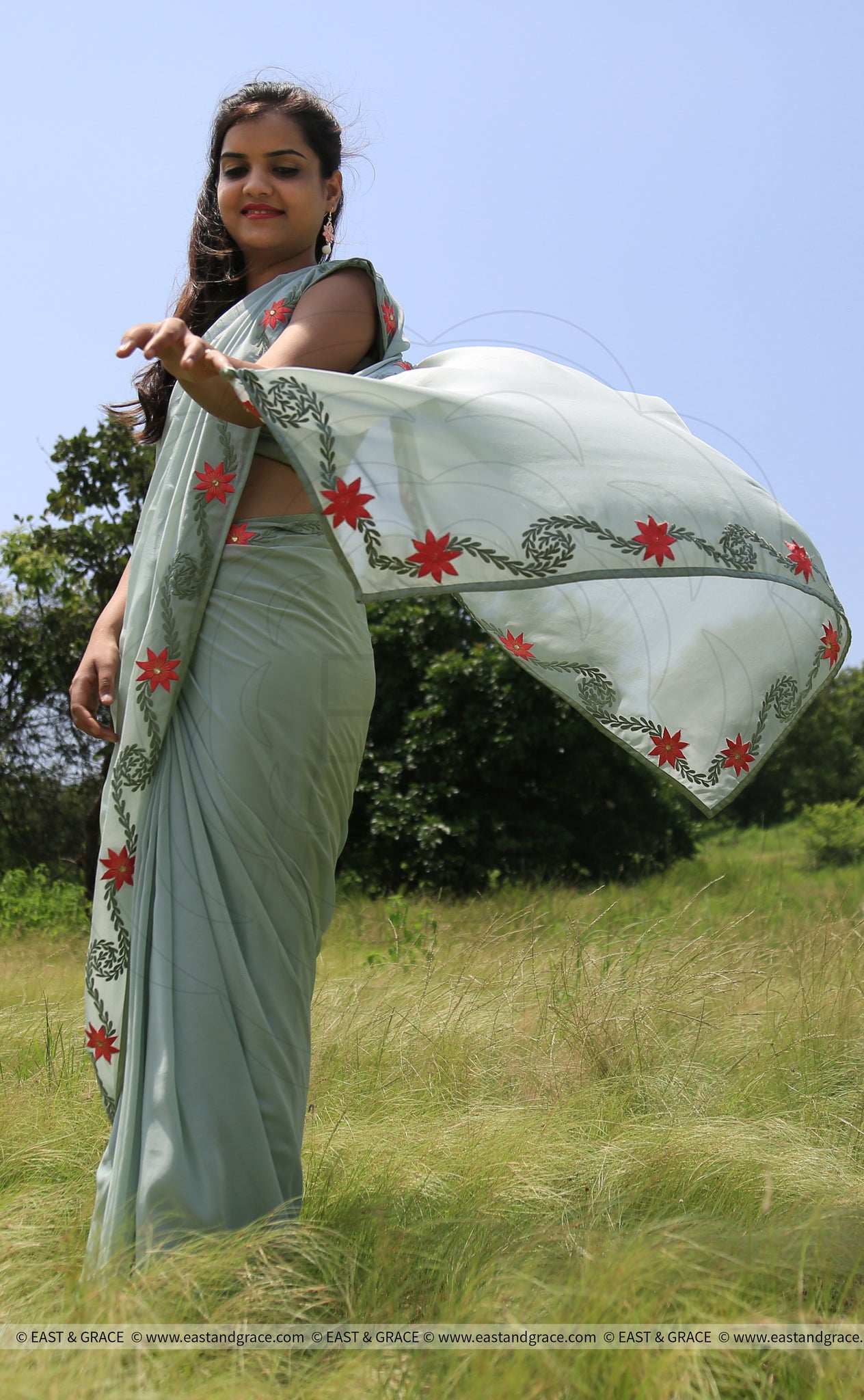 Sage Green Pure Georgette Saree with Embroidered Lilies