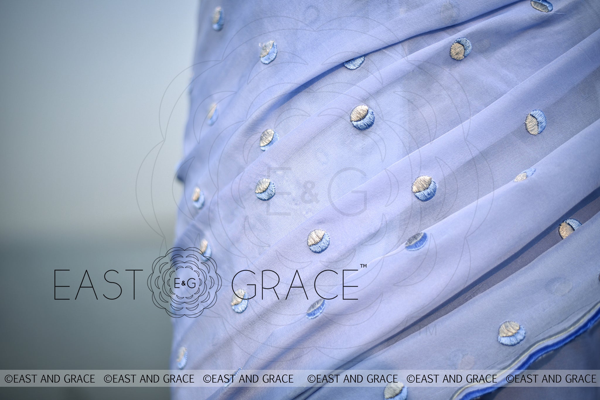 Foget me not blue pure silk chiffon net fabric hand embroidered saree