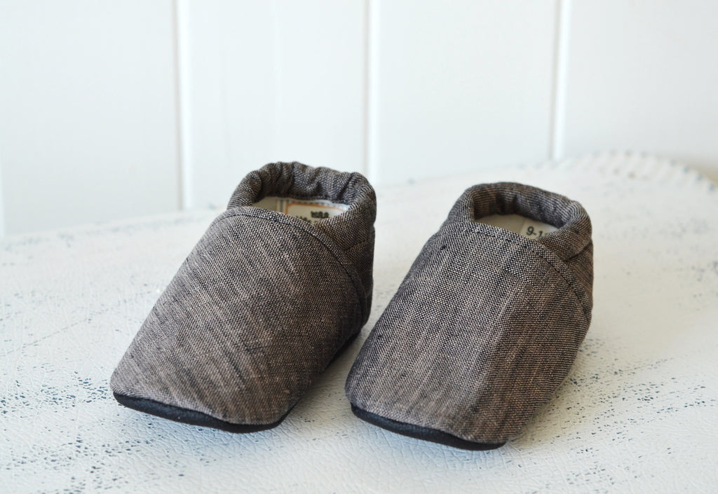 Ash colored baby shoes