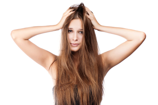 5 Signs You’re Washing Your Hair Too Much