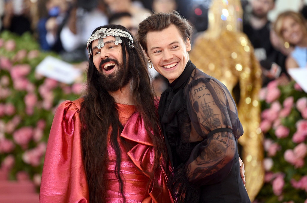 Harry Styles, right, wore a pearl earring to the Met Gala in May. He attended with Alessandro Michele, the creative director of Gucci.Credit...Evan Agostini/Invision, via Associated Press