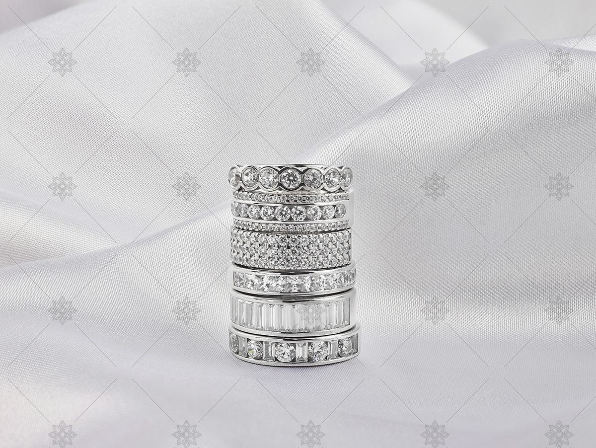 eternity ring stack on white silk 