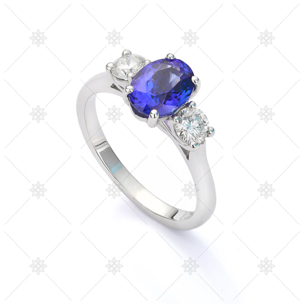 blue sapphire 3 stone ring