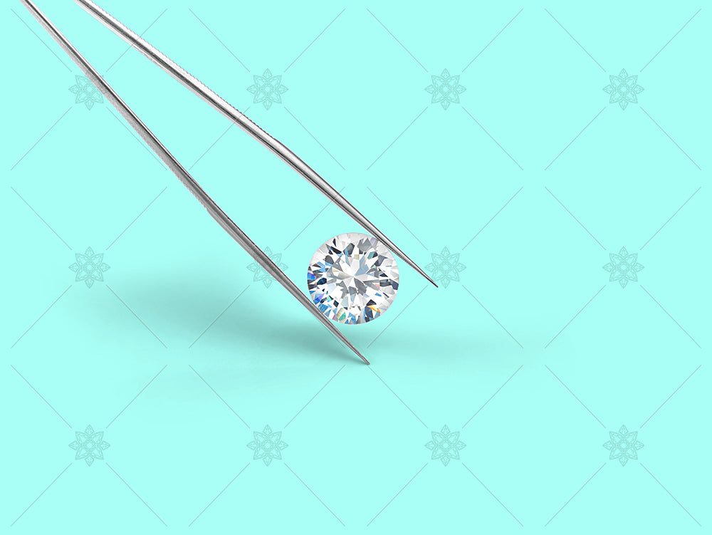 diamond and tweezers on a green background