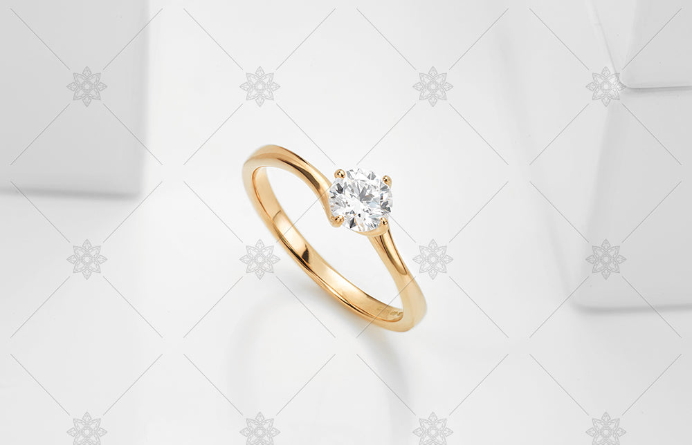 4 claw twist solitaire ring in rose gold