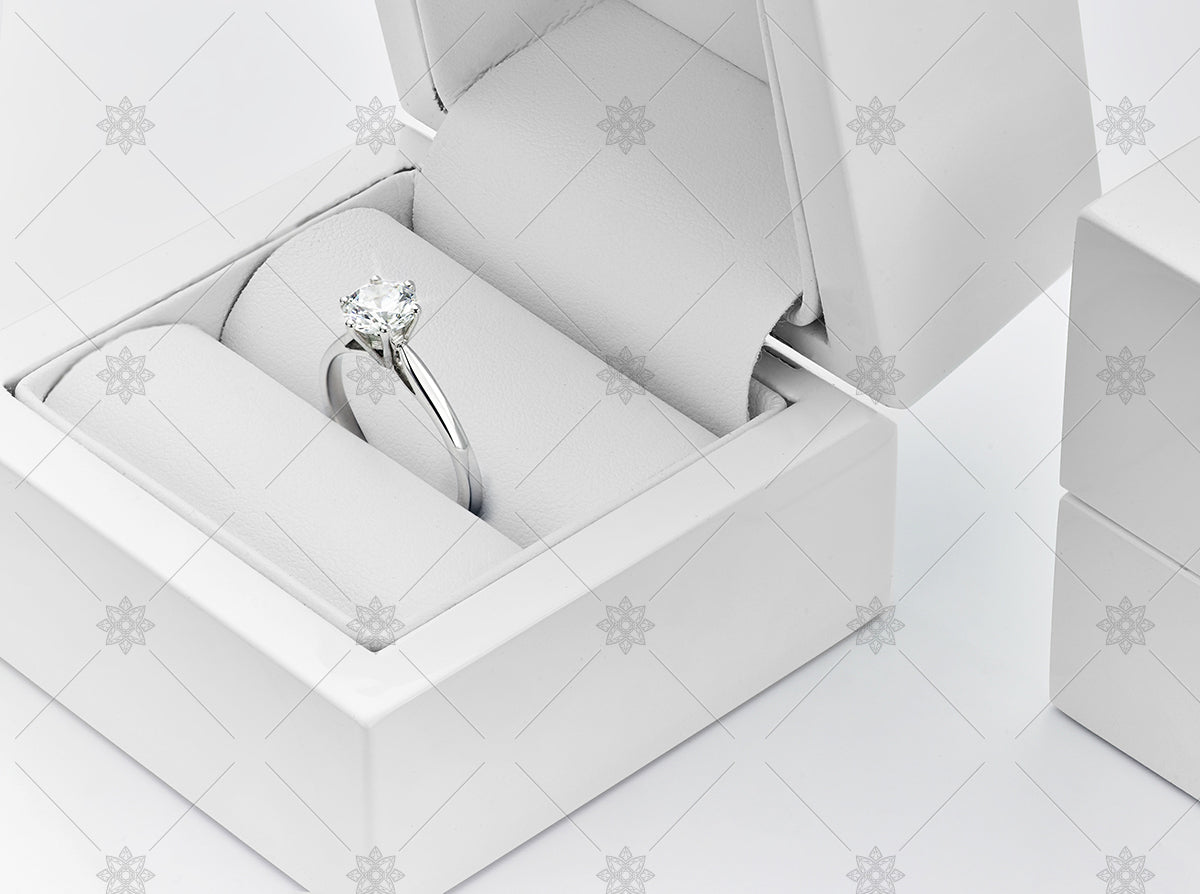 White gold diamond ring in a white jewellery box