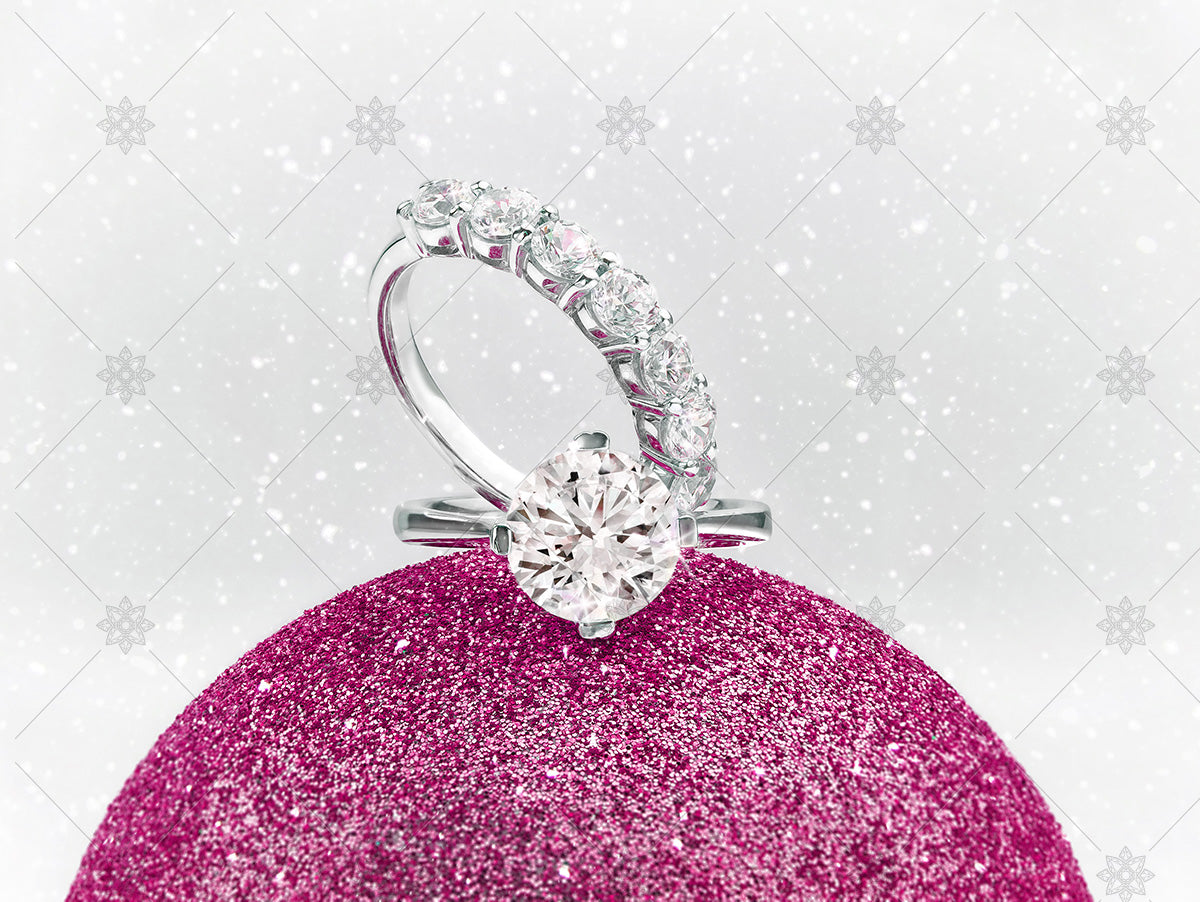 christmas diamond rings on winter sparkly bauble