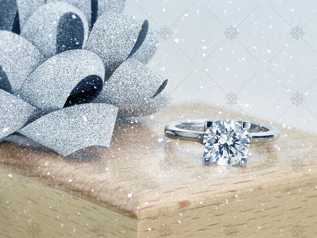winter ring box ribbon and diamond solitaire