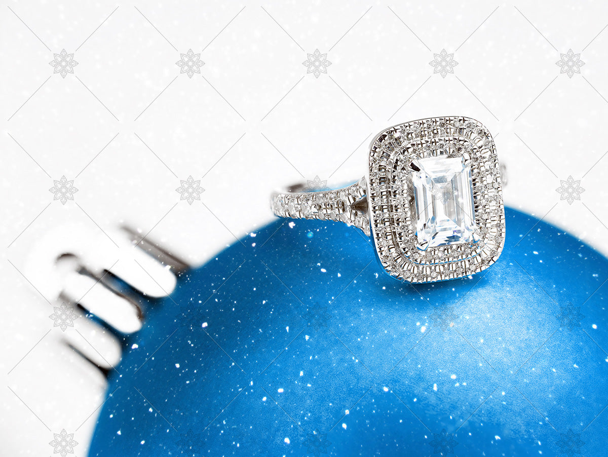 emerald diamond ring on blue bauble