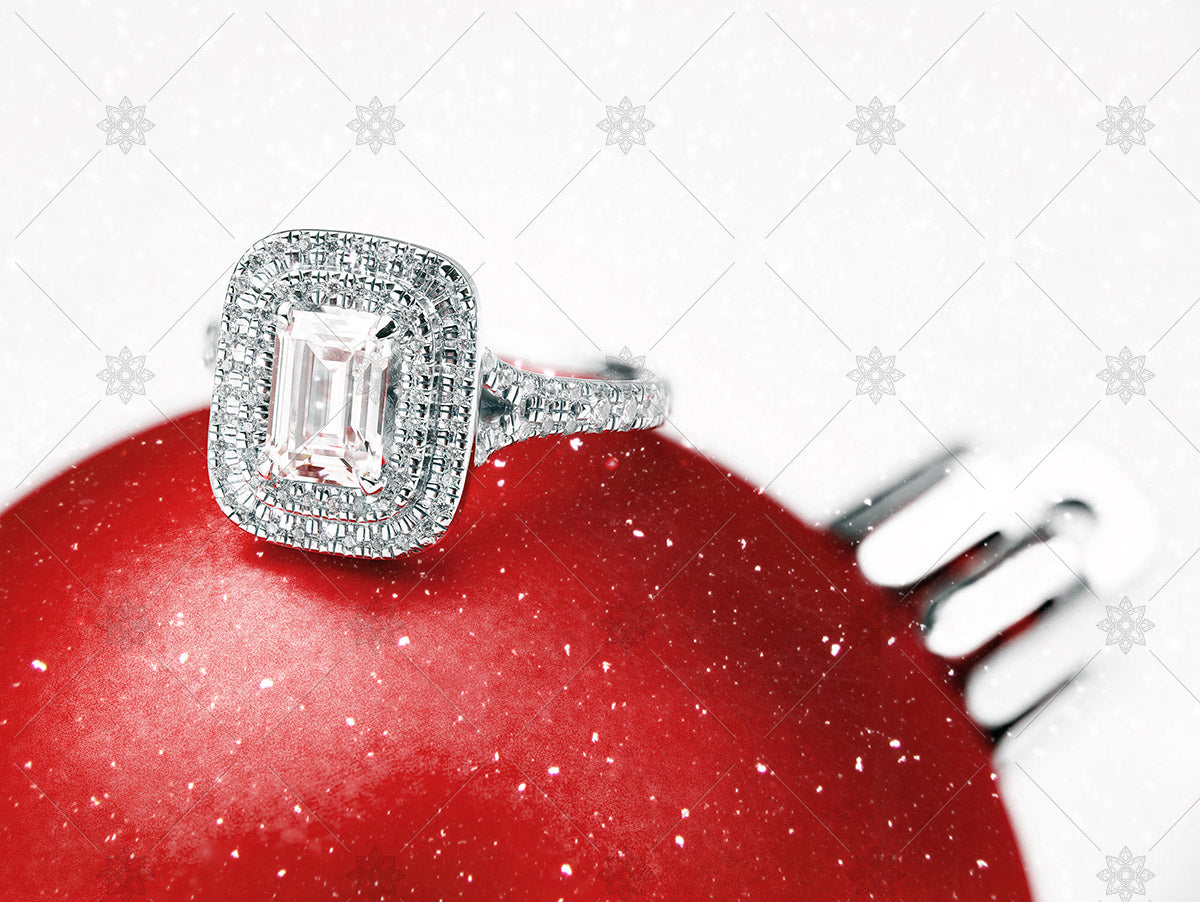 emerald diamond ring on red bauble