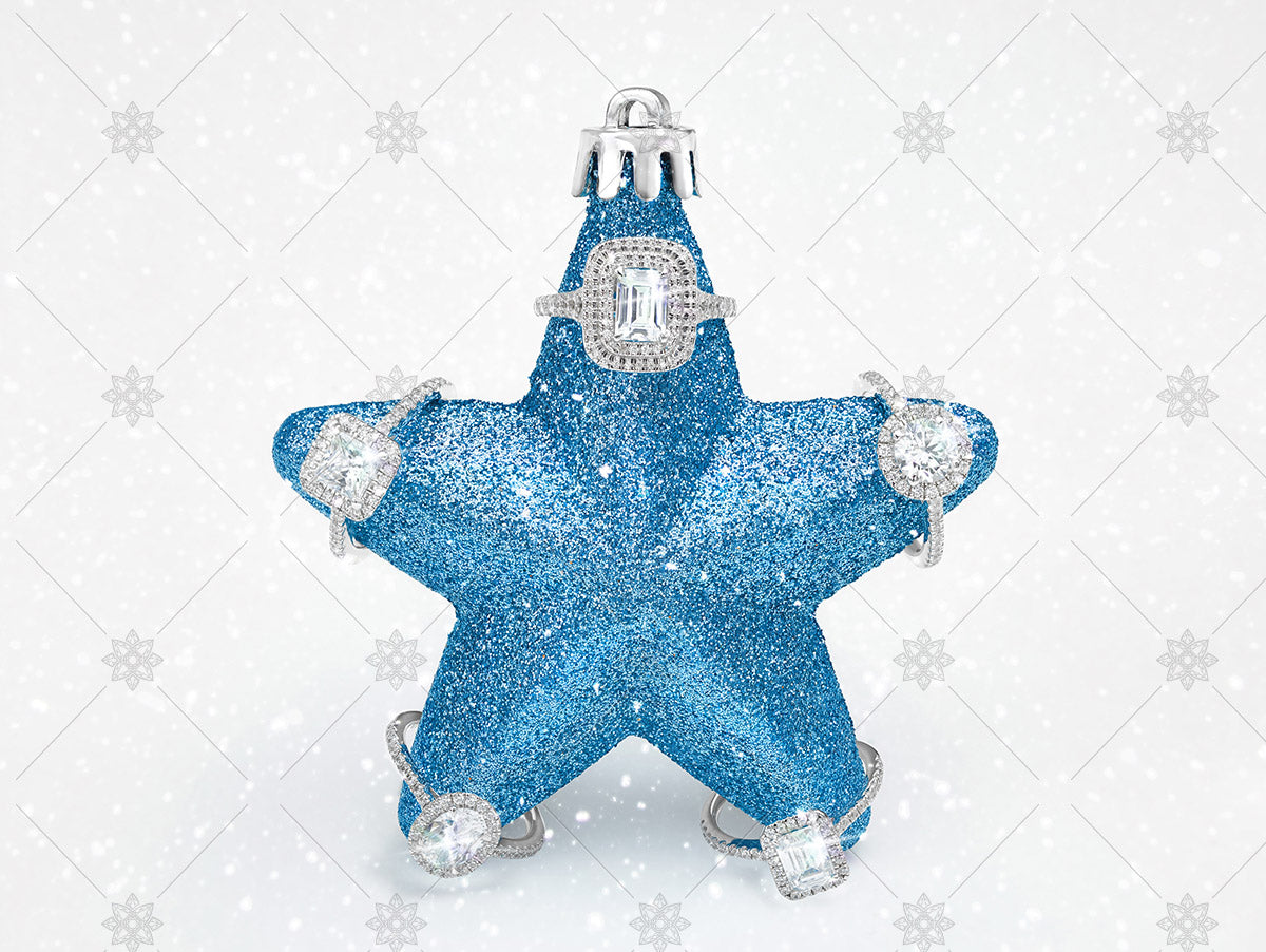 blue christmas star bauble with diamond rings