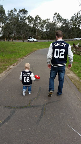 Matching father and son college varsity jackets