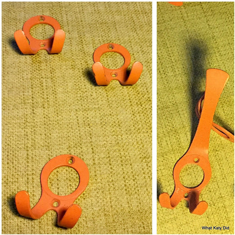 Fab 70s orange coat hooks Dutch retro