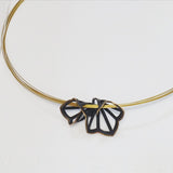 Origami dahlia fold necklace with 18K yellow gold edge