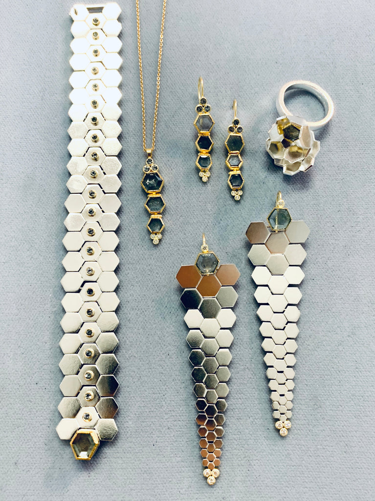 Facets collection in sterling silver, 18k and 22k gold, montana sapphires and gray spinels. Karin Jacobson Jewelry Design