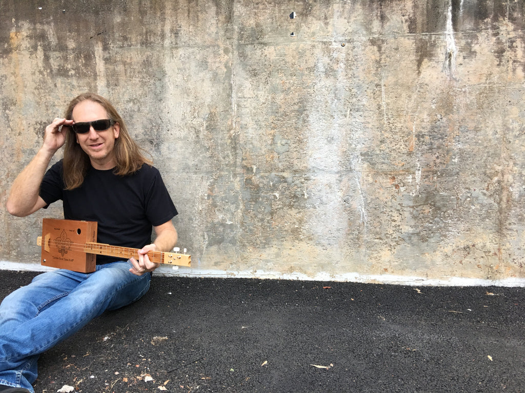 mike snowden cigar box guitar builder