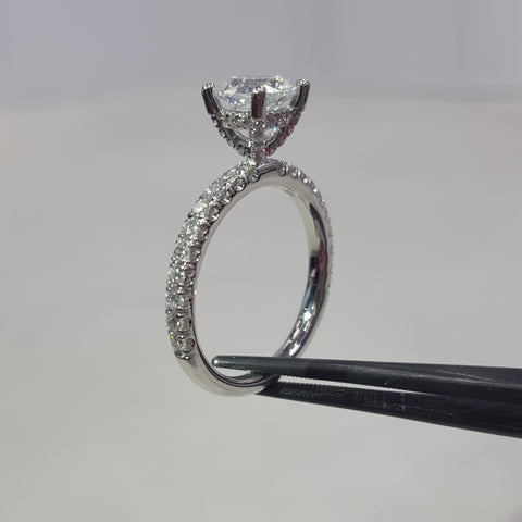 Engagement Ring with Diamonds on Prongs