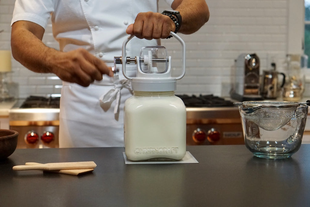 Chef churning butter with Churncraft