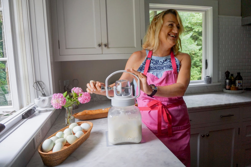 Silvia Baldini churning butter