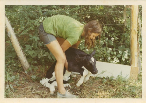 Kristin picking up calf
